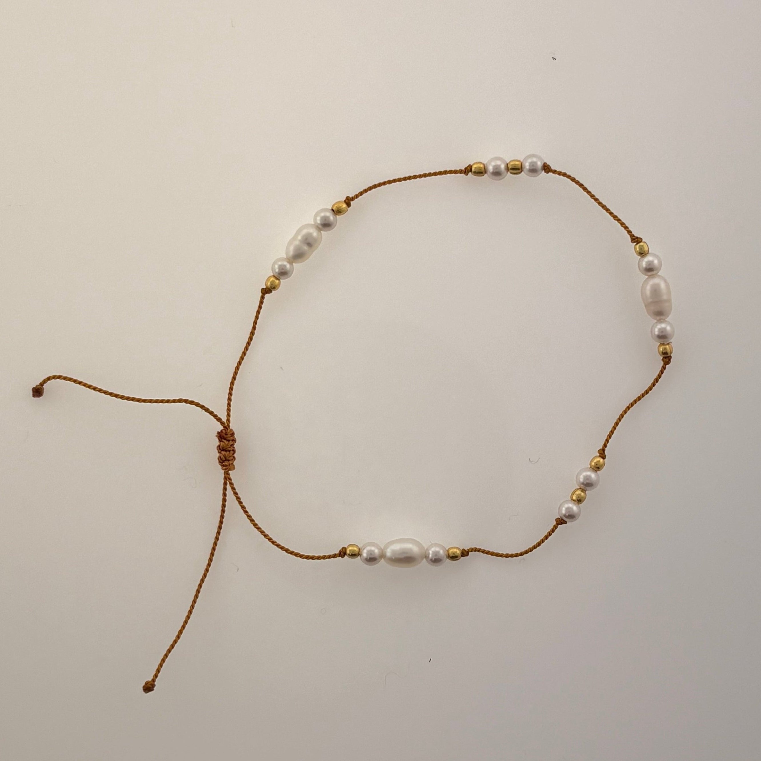 Fresh Water White Pearl Bracelet on thread with Gold plated Beads