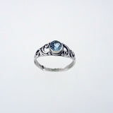 Blue Topaz Faceted 6mm Round Ring with cut out Spirals